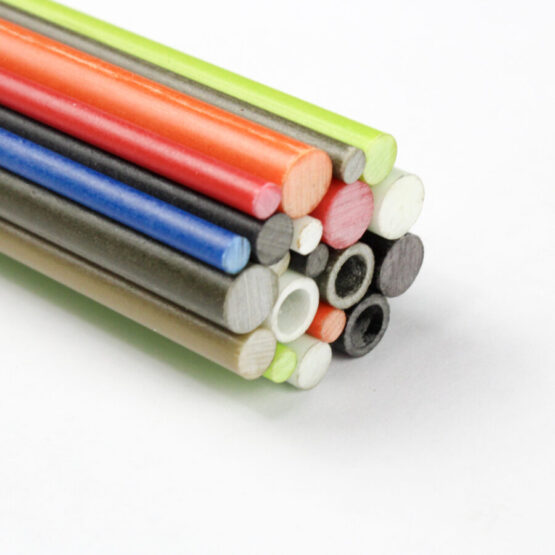Multiple colours of G10 rods and tubes stacked together