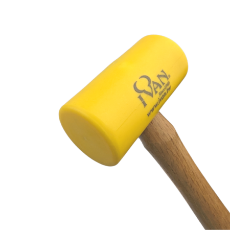 Close up of Artisan Essentials Yellow Poly Mallet 9oz head and face.