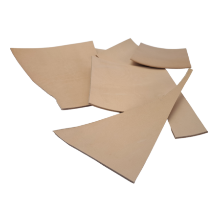 A 500g bag containing offcuts of vegetable tan leather.  The thickness of leather is approximately 2.5 to 3.5 mm.