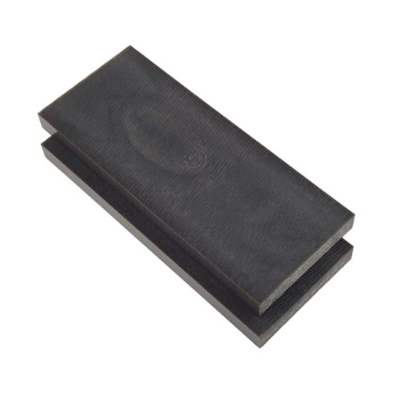 two Juma handle scales with a carbon pattern and width of 50 mm stacked together