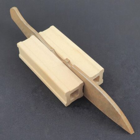 Pair of Ceramic Posts being used to hold a knife blade upright