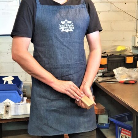 model wearing an Artisan Supplies Denim Apron