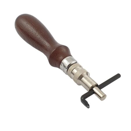 Stitching groover with adjustable spacer arm