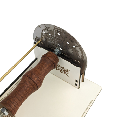 Black Dragon Forge Dagger Handle Divider. Close up showing screws and disc.