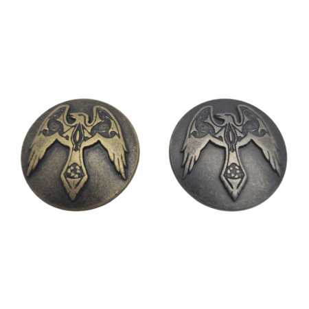 Raven Conchos. Screw Back design, with 2 Finishes available: Antique Brass and Antique Nickel.